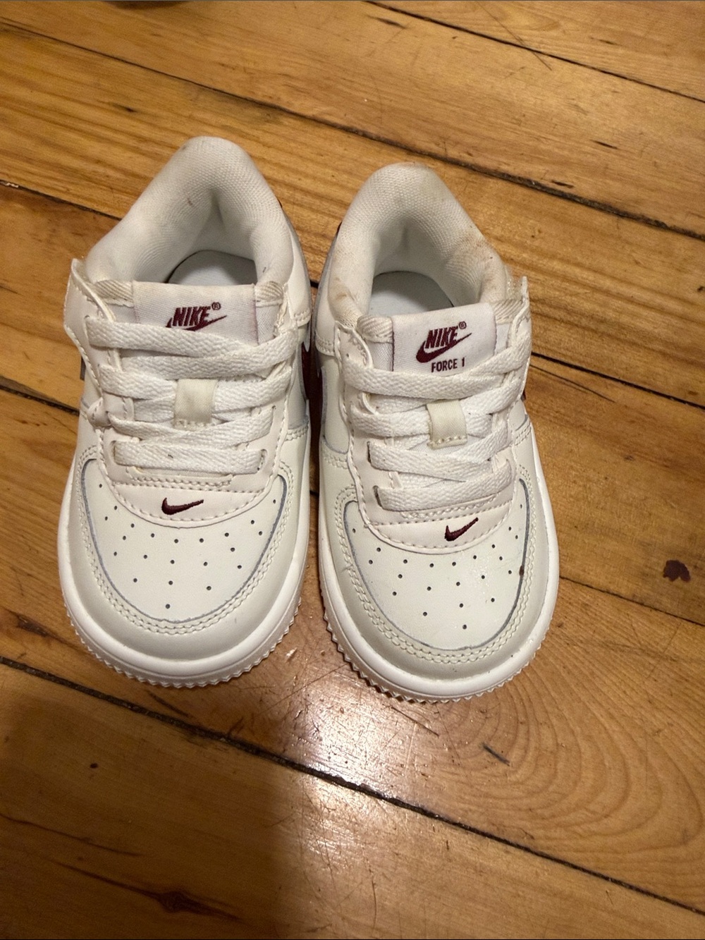 Nike Kids White Sneakers with Maroon Swoosh